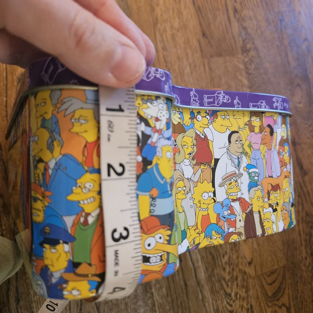 The Simpsons Trivia Game 2000 Board Game in Collectors Tin with Cast Poster